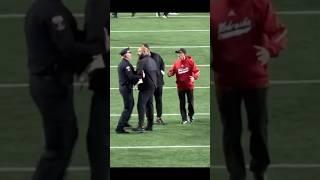 Cop gets aggressive with Nebraska Coach Donovan Raiola