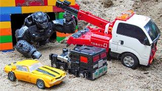 Transformers BATTLE MASTERS: Nemesis Optimus Primal Superhero Dinosaur in Cave - Stopmotion RobotCar