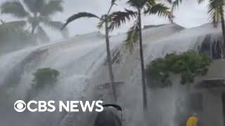 "Historic" waves crash over two-story condos in Hawaii