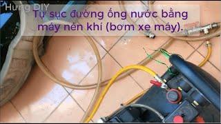 Tự sục, vệ sinh đường ống nước bằng máy nén khí (bơm xe máy)