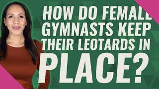 How do female gymnasts keep their leotards in place?