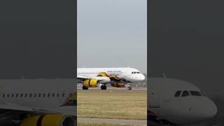 Vueling Special Livery Airbus A320 landing at Amsterdam