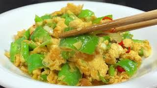 Add three eggs to green peppers. This is the most delicious way to make scrambled eggs with gree