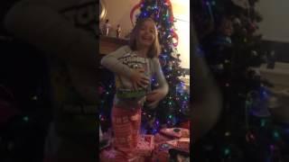 Daughter opens hatchimals on Christmas morning