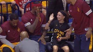 Little girl’s priceless reaction after sitting with LeBron on bench