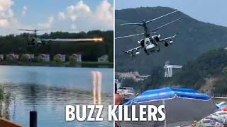 Bizarre moment gung-ho Russian helicopter gunship pilots terrify their own warzone 'tourists'