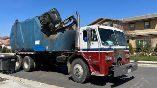 Peterbilt 310 Heil Rapid Rail Side Load Garbage Truck