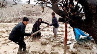 Heavy rain, flooding and destroying the house of nomadic mother