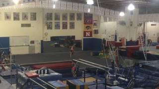 Emma - back handspring layout with a half twist