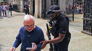 POLICE TOLD HIM TO MOVE - HE CHOSE TO IGNORE IT DURING THE GUARD CHANGE AT Horse Guards!