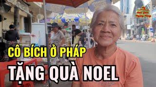 CÔ BÍCH Ở PHÁP TẶNG QUÀ NOEL CHO BẾP CƠM CÔ CƯỜNGNHIỀU CHỊ EM MẶC ÁO DÀI CHỤP HÌNH Ở CHỢ BẾN THÀNH