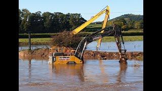 GUY REGRETS PARKING HIS DIGGER HERE!