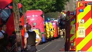 100 firefighters tackle large flat fire in Hackney