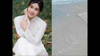 Duyên dáng tà áo dài trắng tinh khôi bên bờ biển - Charming pure white ao dai by the beach