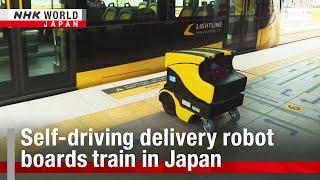 Self-driving delivery robot boards train in JapanーNHK WORLD-JAPAN NEWS