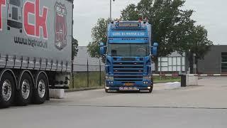 Trucks arrive at Truckshow [open pipe sounds]