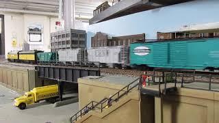 Chicago & NorthWestern R R freight train crossing over the viaduct.