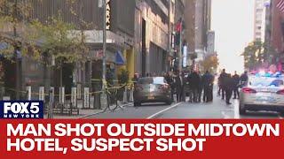 Man shot outside Midtown hotel; suspect sought