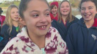 Local swim team continues 30-year tradition of jumping into Lake Natoma