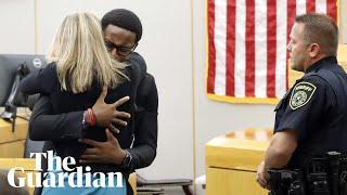 Botham Jean's brother hugs ex-officer Amber Guyger after sentencing