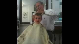 Xanders haircut with daddys barber mike 8/12/09