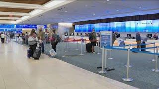 Tech issues, weather affecting national travel for holidays