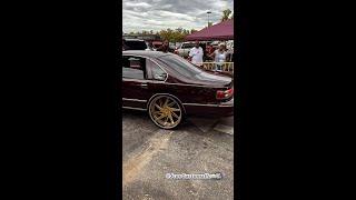 Chevy mounted on 26" Gold Wheels by Amani Forged