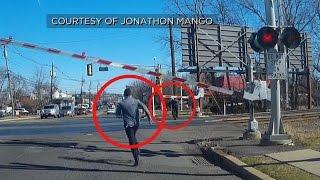 Exclusive: Man Saves Senior from Oncoming Train!