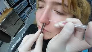 Nose piercing with a hoop for Jessie