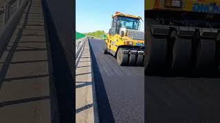 The asphalt road is built in one shape- Good tools and machinery make work easy