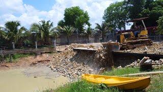 Amazing Work connect 100%! Use stone pouring in pond to block water by Dozer Komatsu with dump truck