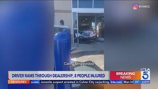 Video shows upset customer ram into CarMax, 8 injured