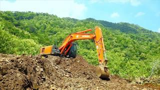 Hitachi Zaxis Excavator Excavating Dirt Building A New Winding Road