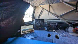 Truck bed camping Softopper setup for overlanding - BamBeds Platform System & Jackery to power a fan