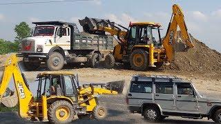 JCB Dozer Loading Stone In Truck - RoadPlanet Dozer Video