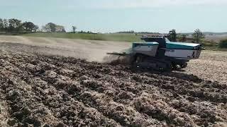 Amos Power Pulling a Chisel Plow