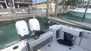 How to dock a twin outboard boat in a slip with heavy tide. Blackfin 332.