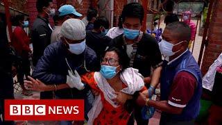 Families in Nepal forced to say goodbye through crematorium gates - BBC News
