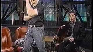 Jon Stewart interviews David The Rock Nelson