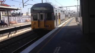 Sydney Trains S135 and S127 pass through Cabramatta