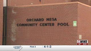 City of Grand Junction and Mesa County Valley School District 51 Sign Orchard Mesa Community Pool...