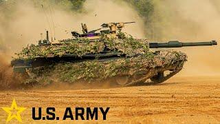 US Army. Powerful M1A2 Abrams tanks and infantry fighting vehicles in action.