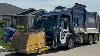 2 Waste Connections Garbage Trucks Getting it Done in Canada!