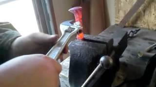 twisting a railroad spike knife