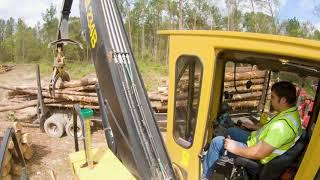 Tigercat 234B Knuckle Boom Loading Short Broken Trees