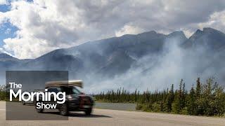 Jasper wildfire: Evacuees flee national park as nearby communities on edge