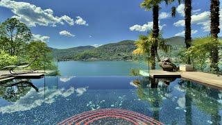 Modern luxury villa overlooking Lake Lugano for sale in Montagnola, Ticino, Switzerland