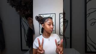 Natural hairstyle: two high buns on natural hair