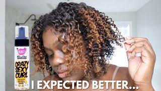 USING MY FAV MOUSSE FOR A TWIST OUT...