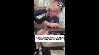 Toddler fitted with hearing aid hears sounds for the first time